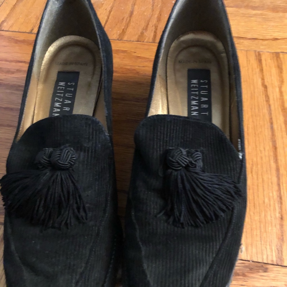 Black loafer with two tassels each